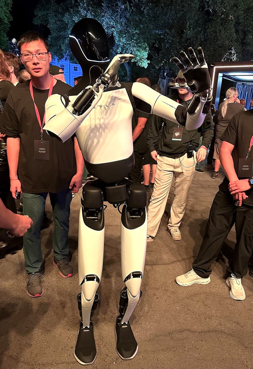 Engineer with a humanoid robot